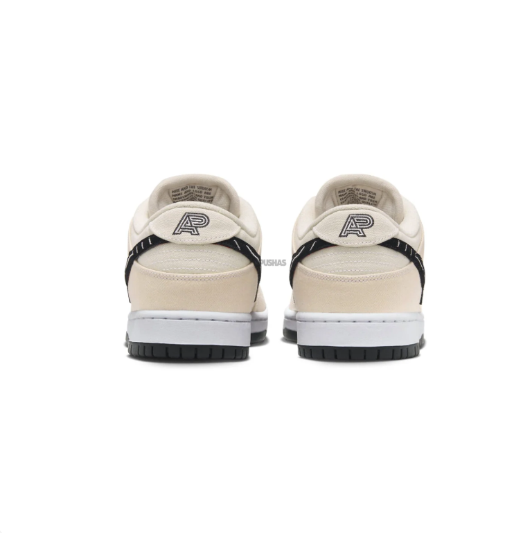 Nike SB Dunk Low Pro Sneakers - Cream with Black Graphic Swoosh